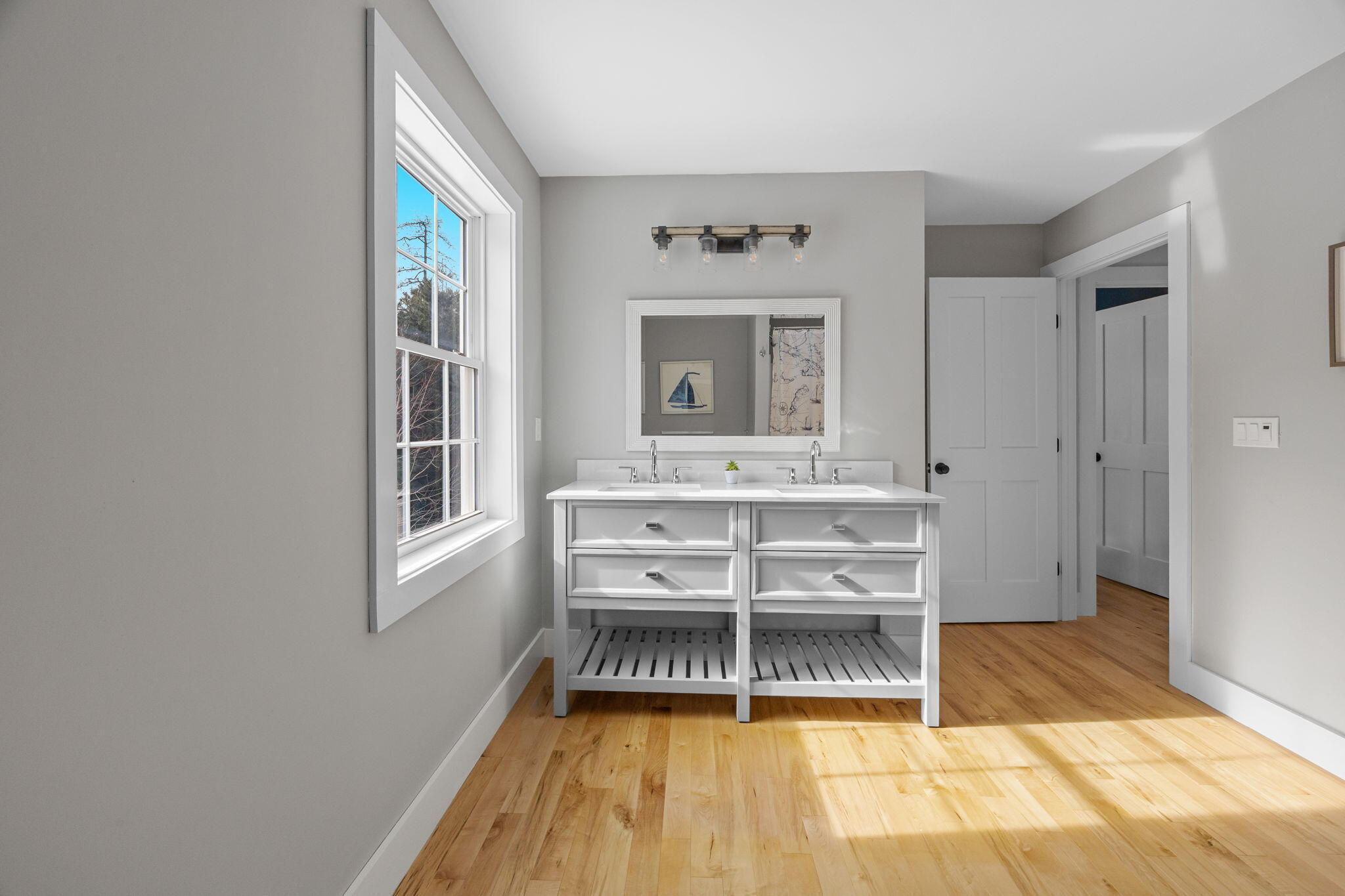 174 Cross Neck Road Marion, MA 02738 - Photo 26 of 41 a view of a bedroom with a bed and a window