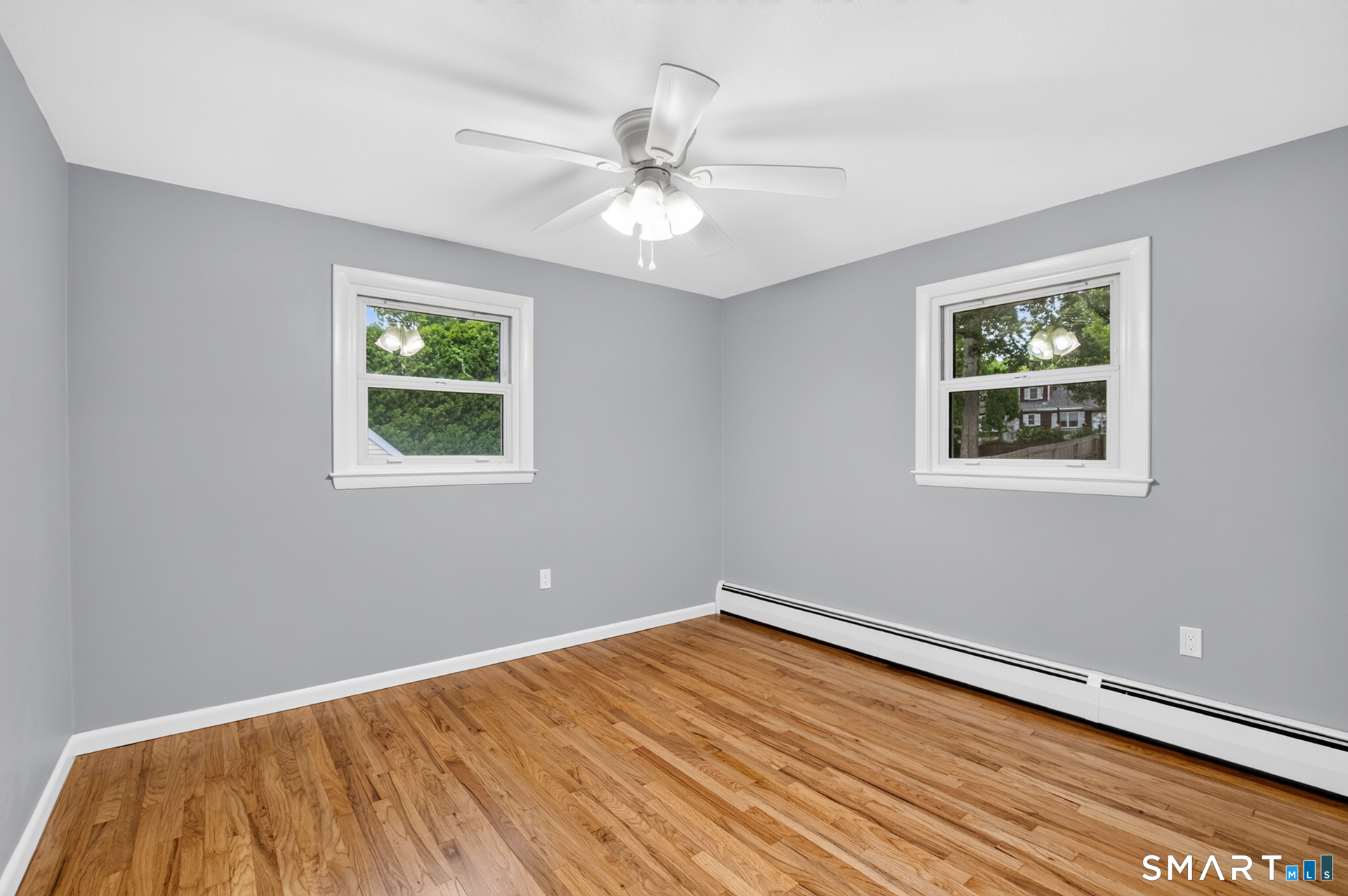 51 Beechwood Road Montville, CT 06370 - Photo 15 of 27 Bright Secondary Bedroom with Hardwood Flooring