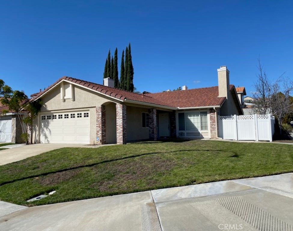 30284 Silver Ridge Court Temecula, CA 92591 - Photo 1 of 1 a view of a house with a yard and potted plants