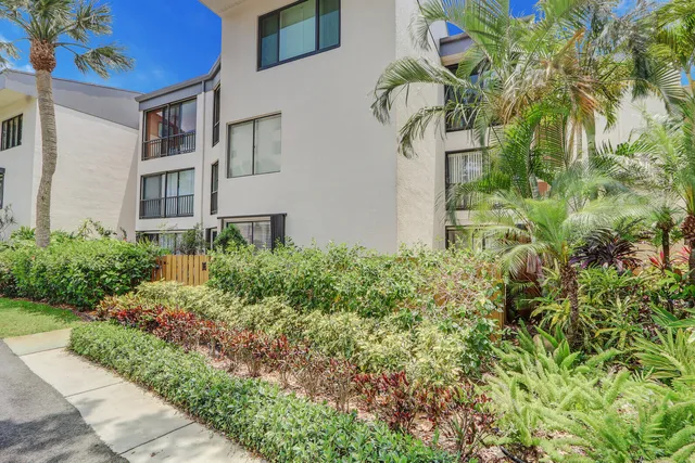 a flower plants in front of a building