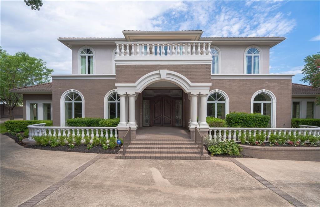 4204 Long Champ Drive Austin, TX 78746 - Photo 1 of 1 front view of a house with a garden