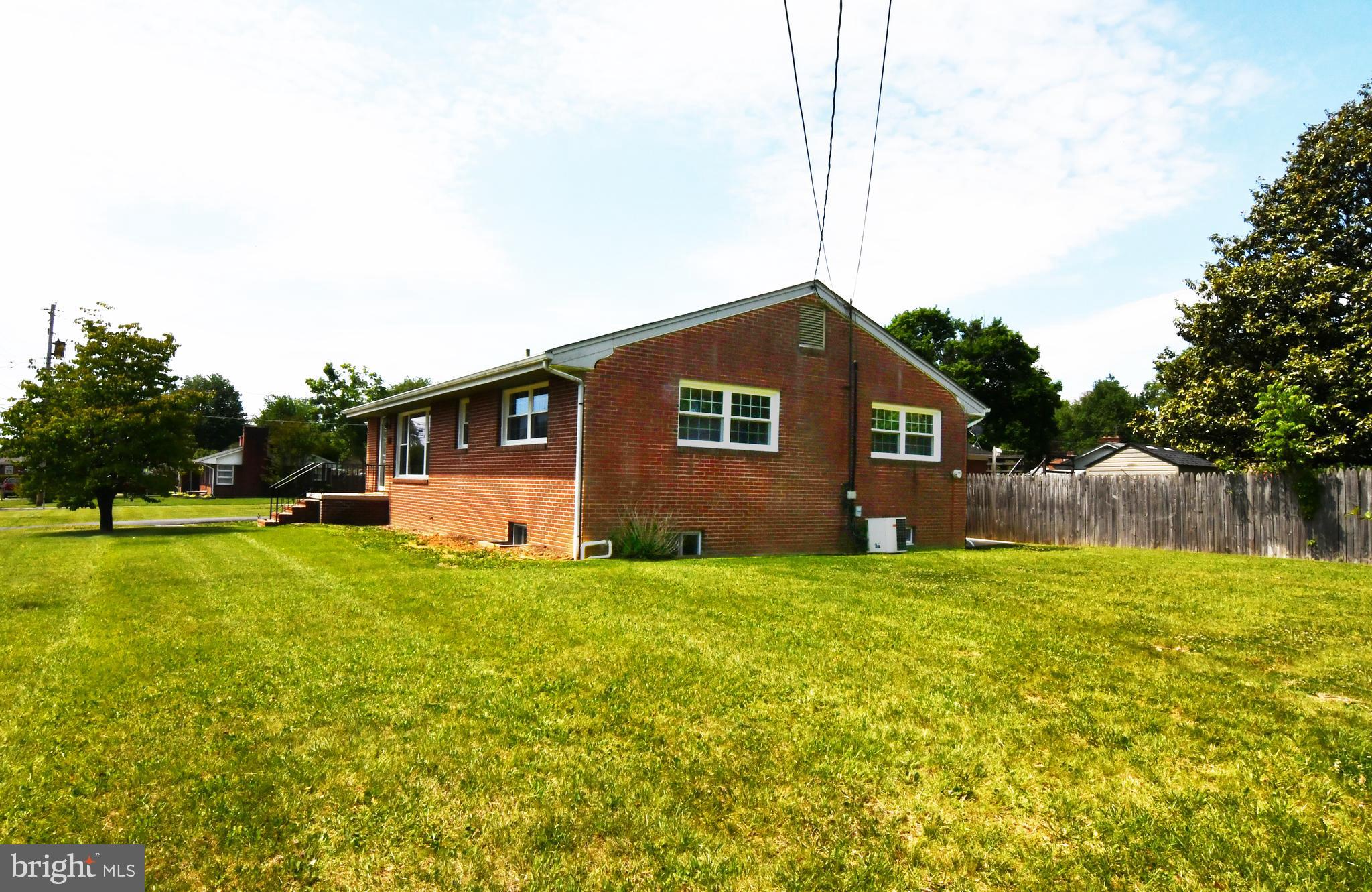 437 Beechcroft Road Winchester, VA 22601 - Photo 5 of 52 a house view with swimming pool in front of it