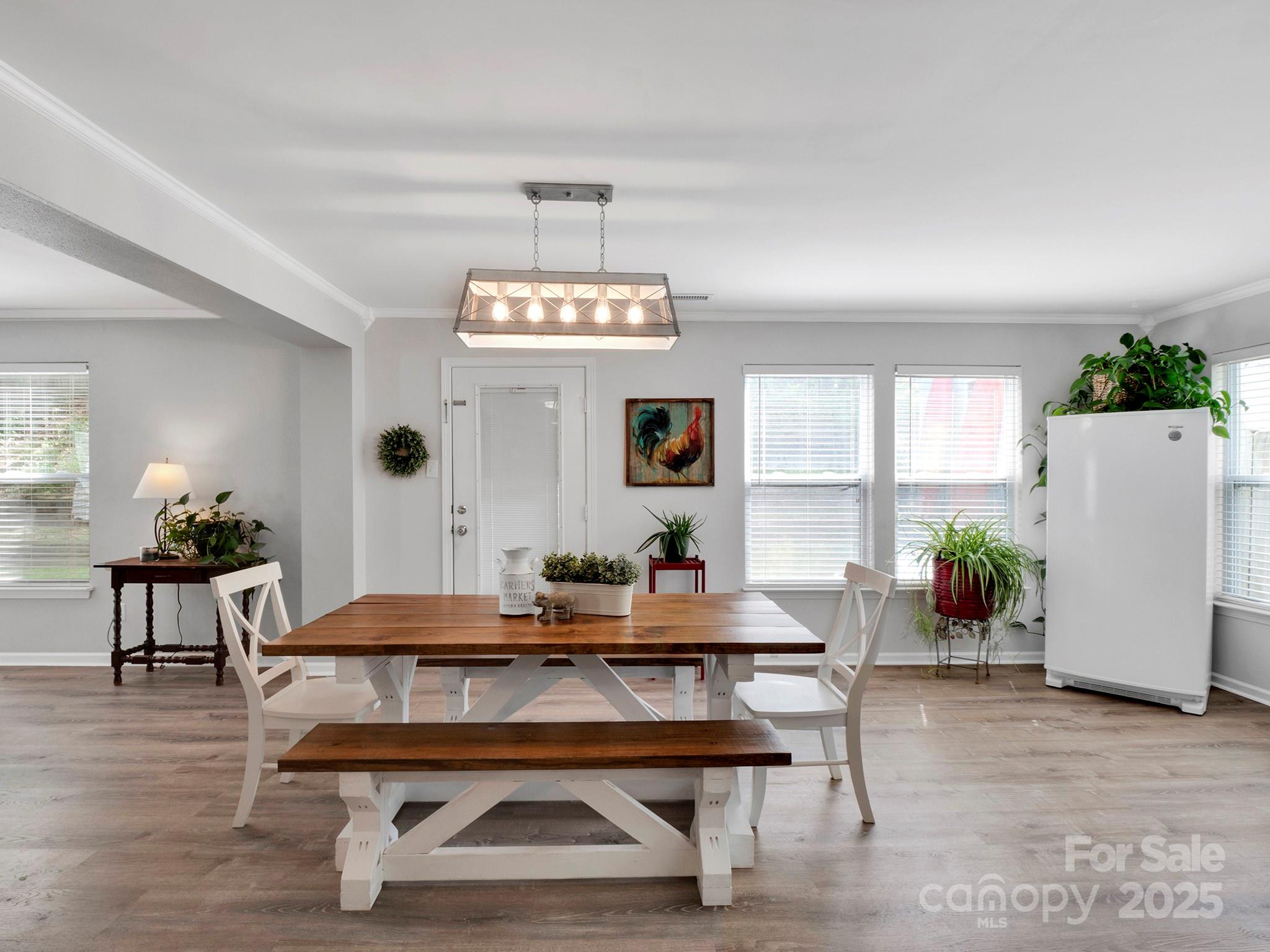 4148 Shasta Circle Clover, SC 29710 - Photo 21 of 48 a view of a dining room with furniture window and wooden floor