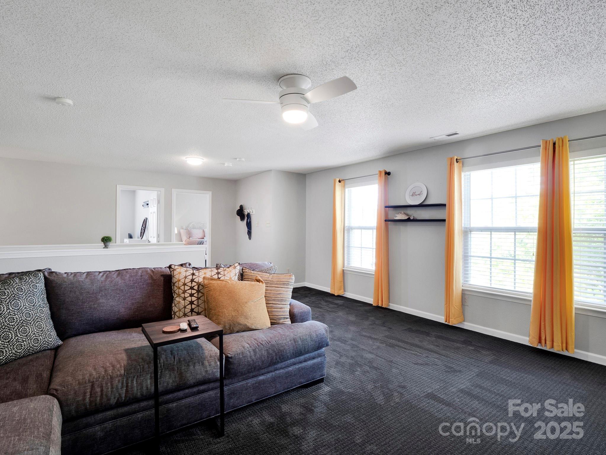 4148 Shasta Circle Clover, SC 29710 - Photo 30 of 48 a living room with furniture and kitchen view