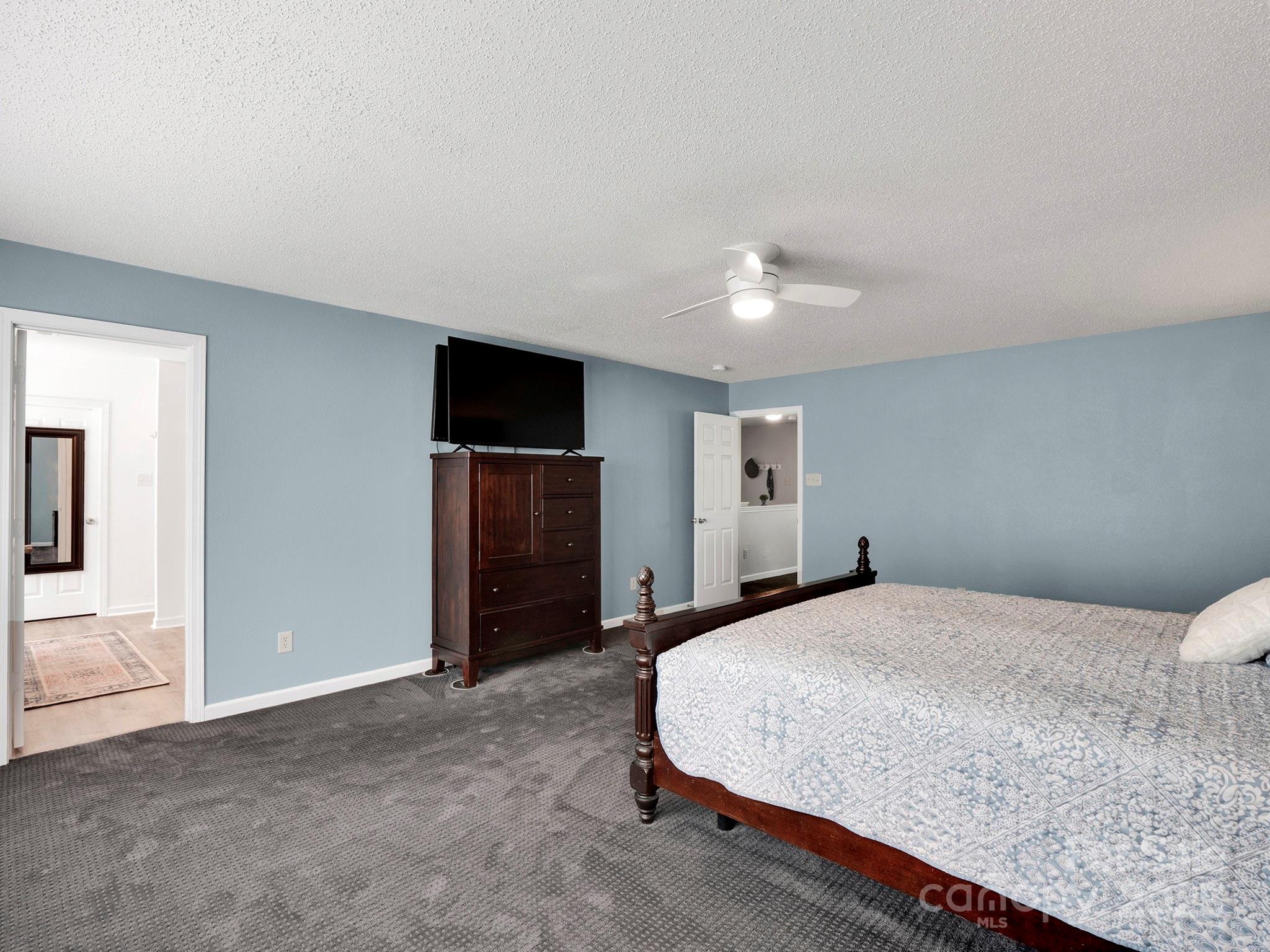 4148 Shasta Circle Clover, SC 29710 - Photo 33 of 48 a bedroom with a bed and a television