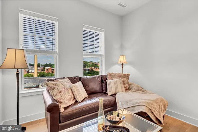 a view of hallway with stairs and closet