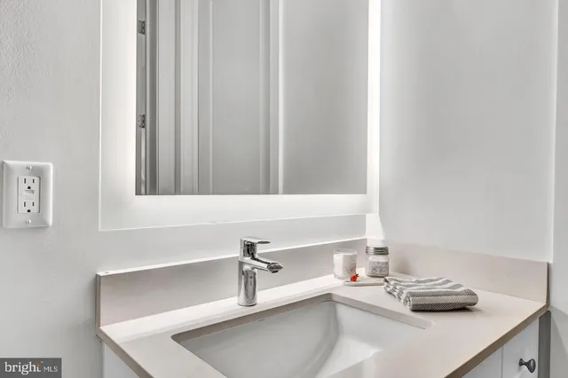 a view of kitchen island and wooden floor