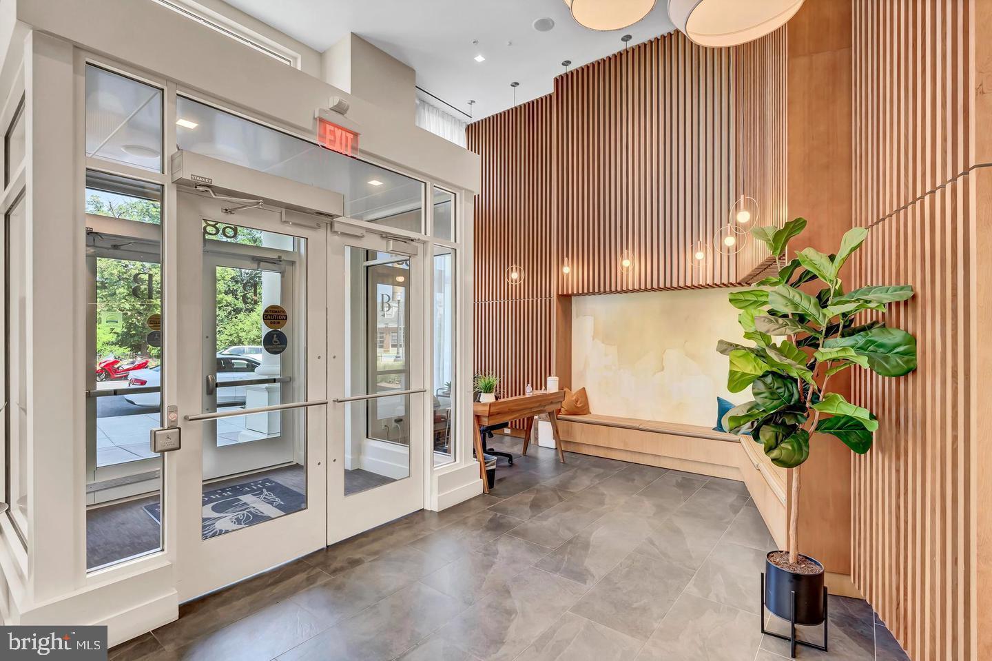 6803 Cameron Drive Northwest, Unit 514 Washington, DC 20012 - Photo 3 of 50 a view of an entryway with wooden floor