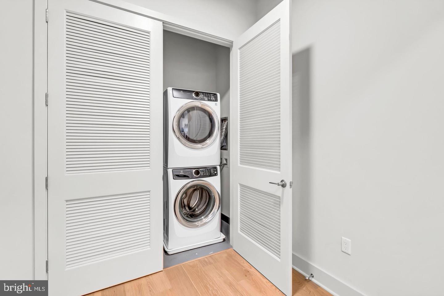 6803 Cameron Drive Northwest, Unit 514 Washington, DC 20012 - Photo 36 of 50 a utility room with dryer and washer