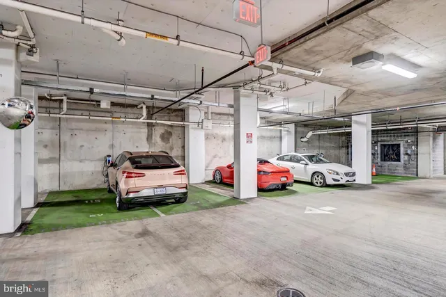 a view of living room filled with furniture and a potted plant