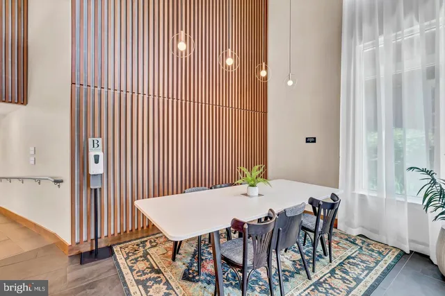 a view of an entryway with a kitchen