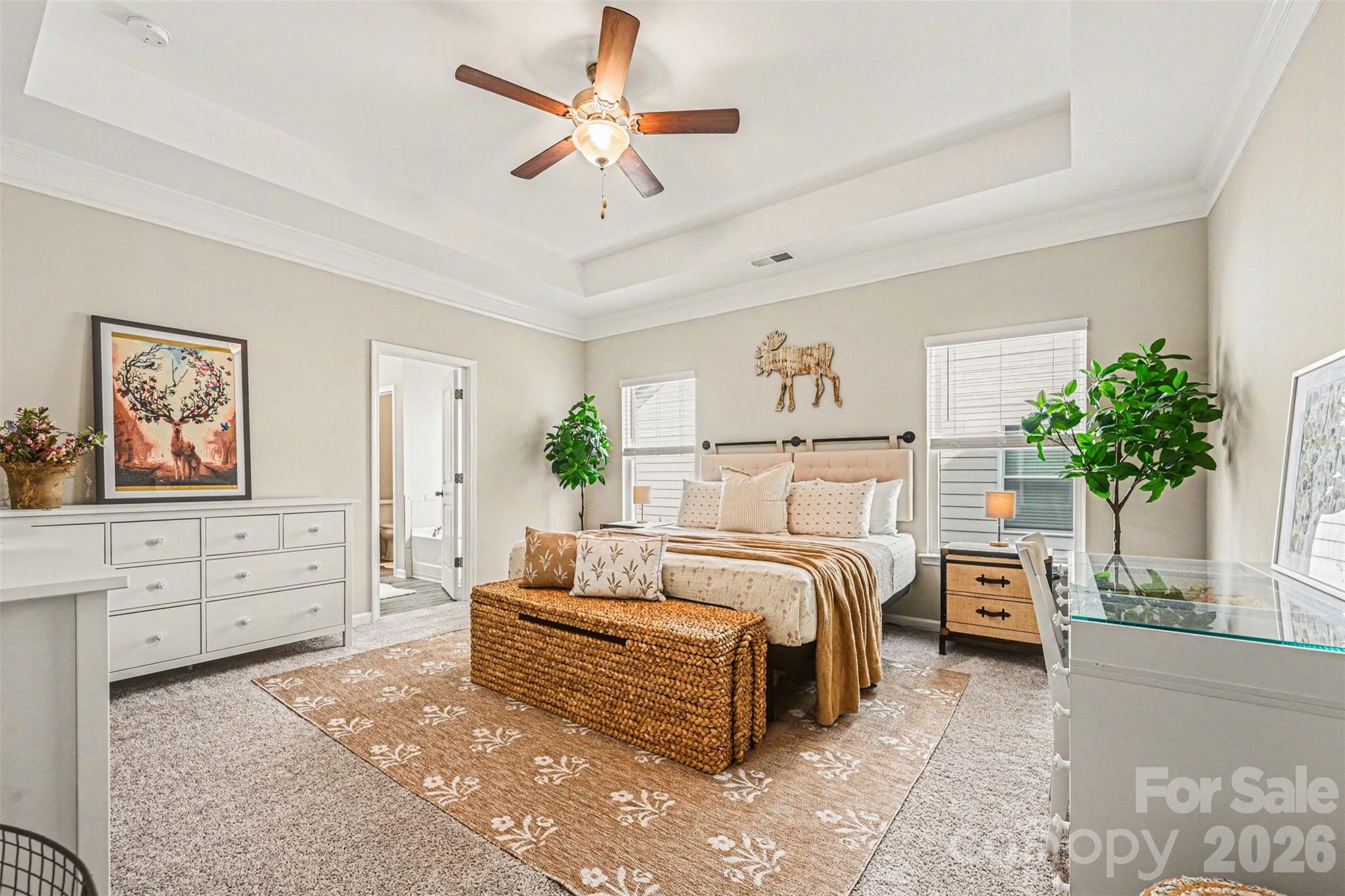 425 Kiser Lane Locust, NC 28097 - Photo 17 of 25 a bedroom with a bed and a chandelier