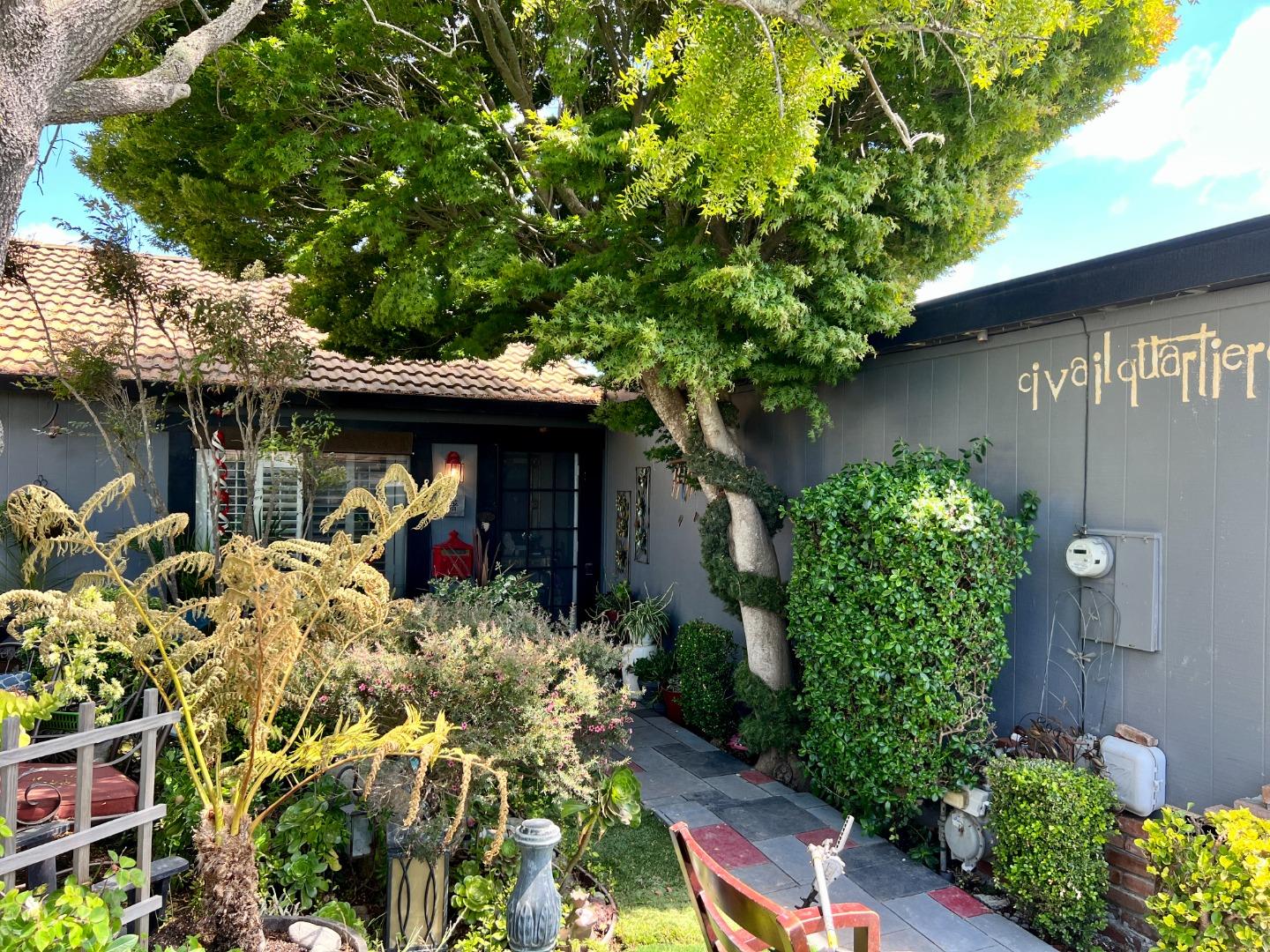 1075 Howe Circle Salinas, CA 93907 - Photo 2 of 3 a front view of a house with a tree
