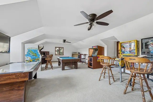 a room with furniture and a flat screen tv