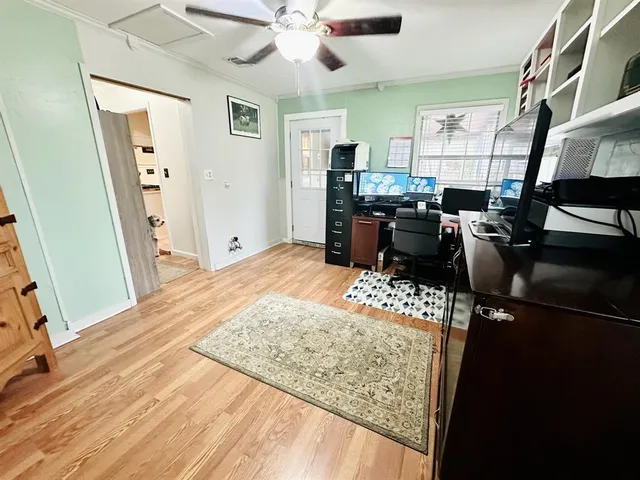 a kitchen with a table and chairs