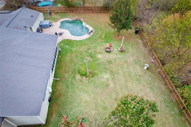 a garden view with a sitting space