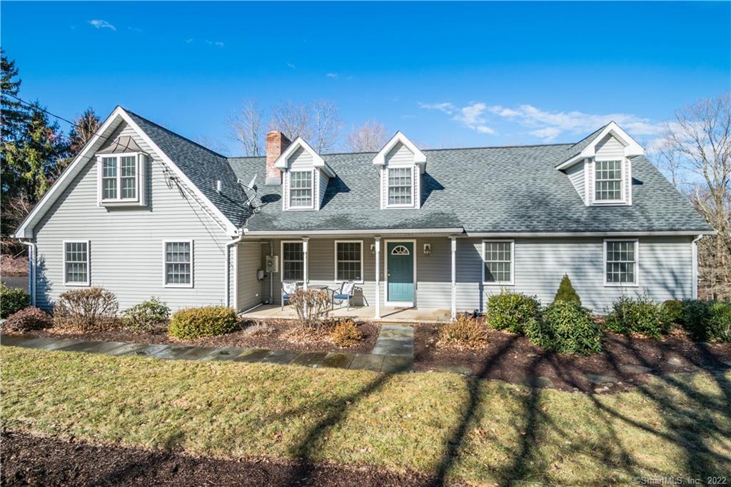 1 Sugarloaf Road Newtown, CT 06482 - Photo 1 of 1 a front view of a house with a yard