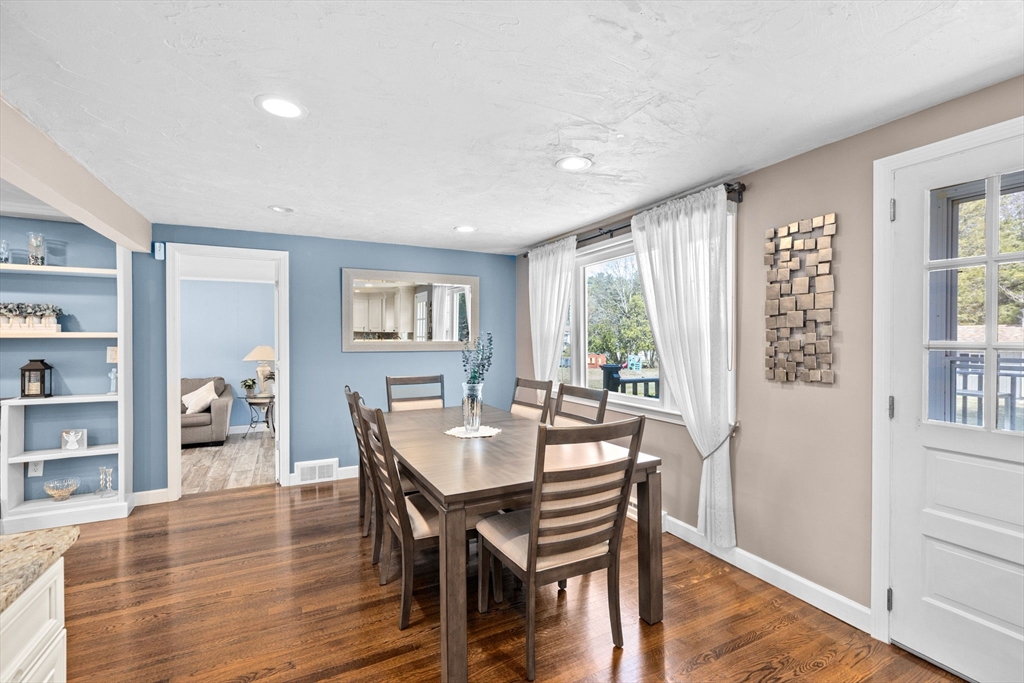 1368 Bay Road Stoughton, MA 02072 - Photo 12 of 42 a view of a dining room with furniture window and wooden floor