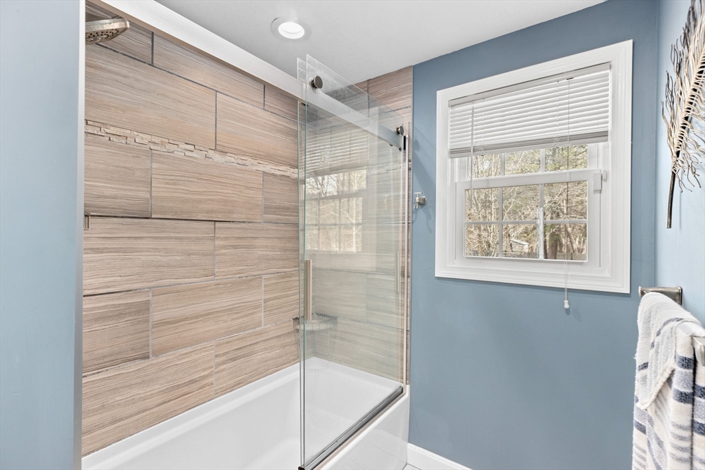 1368 Bay Road Stoughton, MA 02072 - Photo 22 of 42 a bathroom with a bathtub