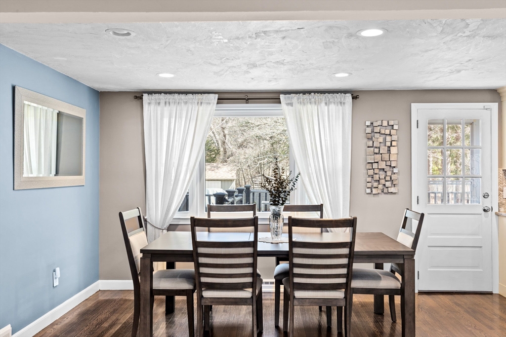1368 Bay Road Stoughton, MA 02072 - Photo 8 of 42 a view of a dining room with furniture window and wooden floor
