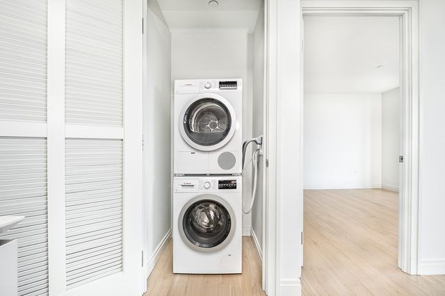 a view of washer and dryer in a utility room