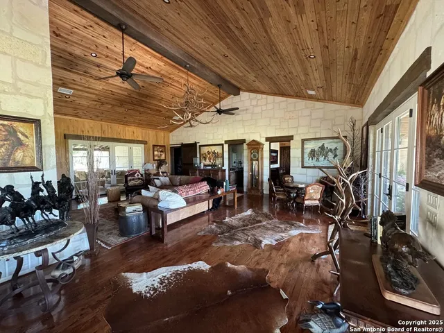 a kitchen with stainless steel appliances granite countertop a stove a refrigerator and a refrigerator