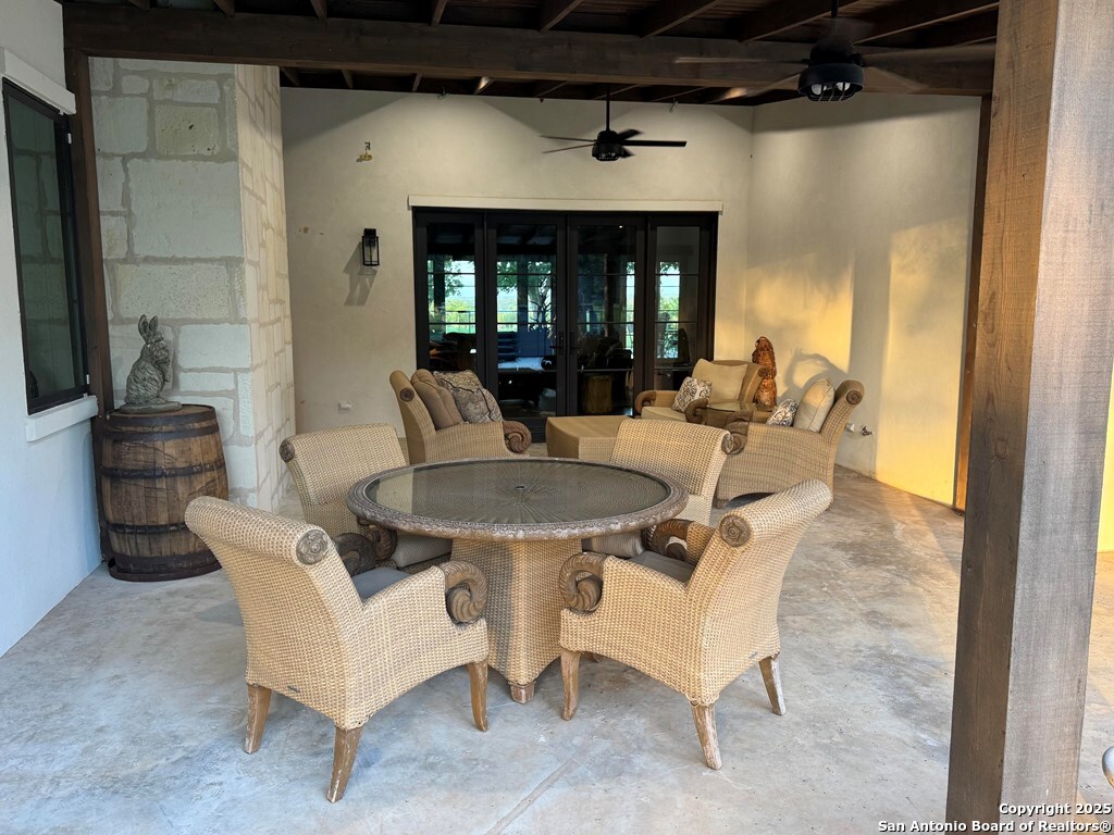 772 Luckenbach Road Fredericksburg, TX 78624 - Photo 58 of 86 a view of a livingroom with furniture and a table