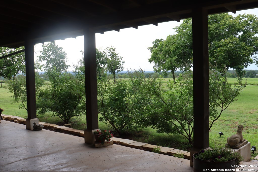 772 Luckenbach Road Fredericksburg, TX 78624 - Photo 63 of 86 a view of a street from a balcony