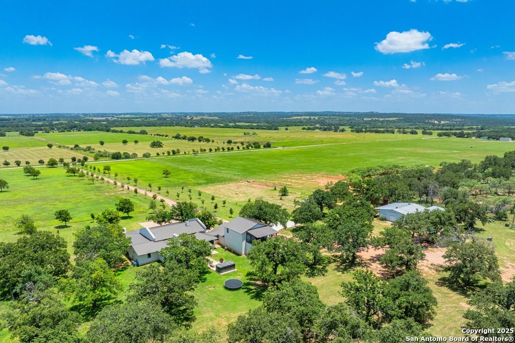 772 Luckenbach Road Fredericksburg, TX 78624 - Photo 78 of 86 a view of a city with a big yard