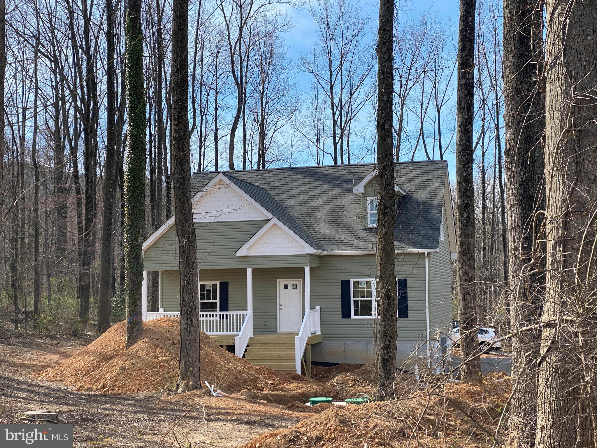 320 Pine Grove Road Bluemont, VA 20135 - Photo 1 of 28 a front view of a house with garden