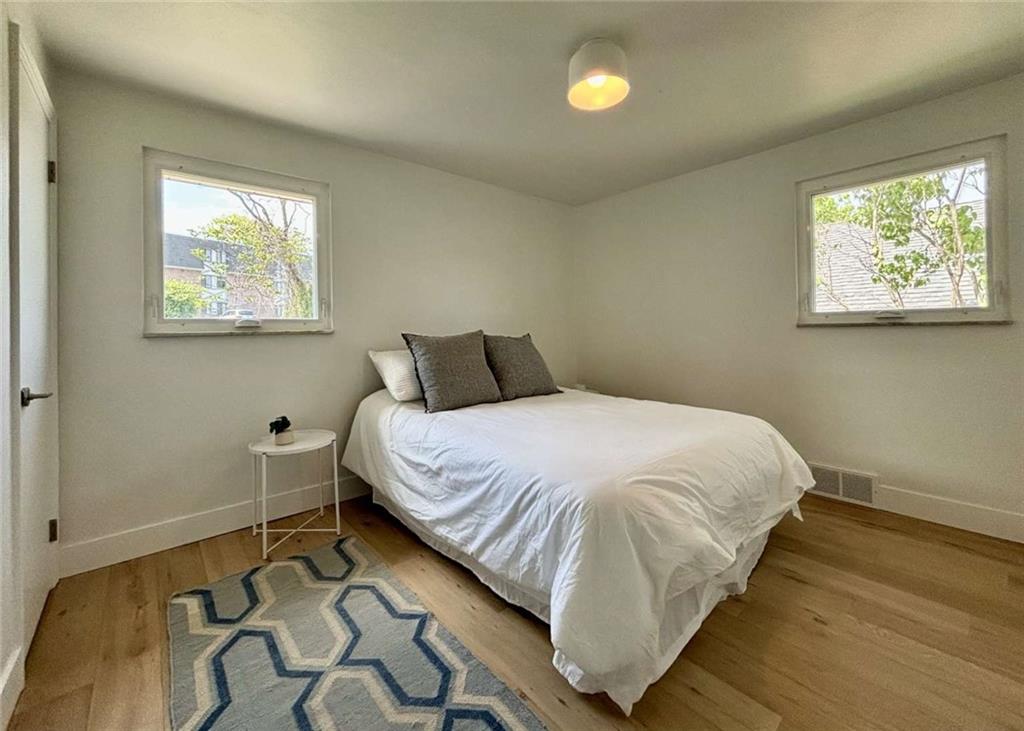 4258 Glen Lytle Road Pittsburgh, PA 15217 - Photo 15 of 19 a bedroom with a bed and window