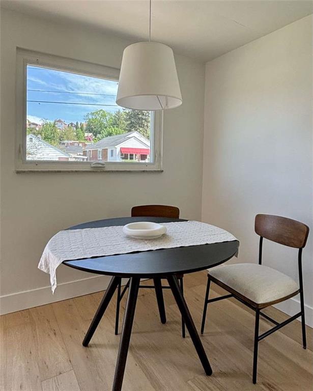 4258 Glen Lytle Road Pittsburgh, PA 15217 - Photo 6 of 19 a view of a room that has a table and a chair