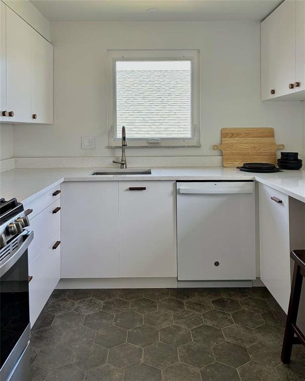 4258 Glen Lytle Road Pittsburgh, PA 15217 - Photo 8 of 19 a kitchen with a sink cabinets and appliances