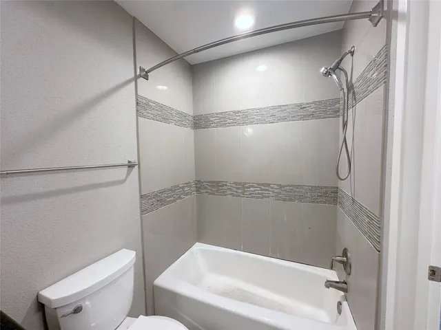 a view of balcony with furniture