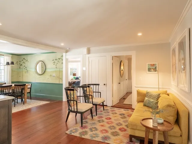 a living room with furniture and a window with outer view