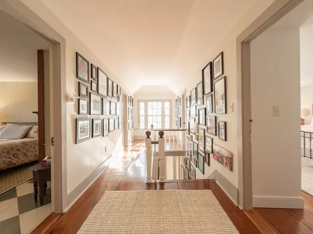 a bedroom with a bed and a fireplace