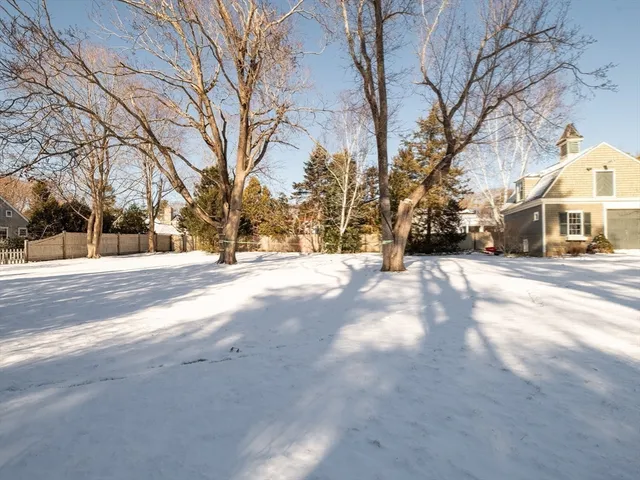a front view of a house with a fence