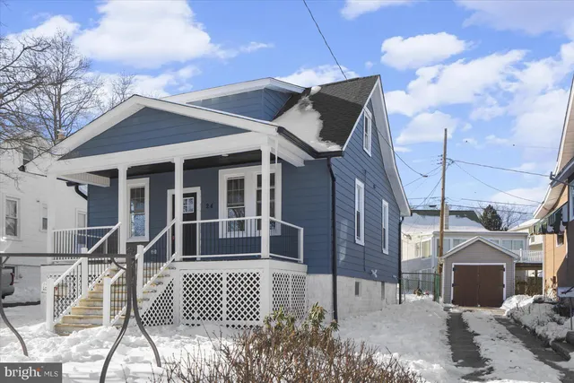 a front view of a house with a porch