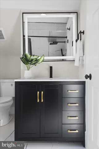 a view of a hallway with wooden shelves