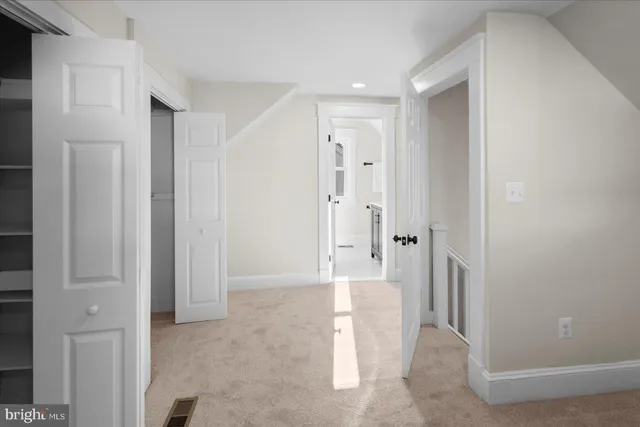 a front view of a house with a rug