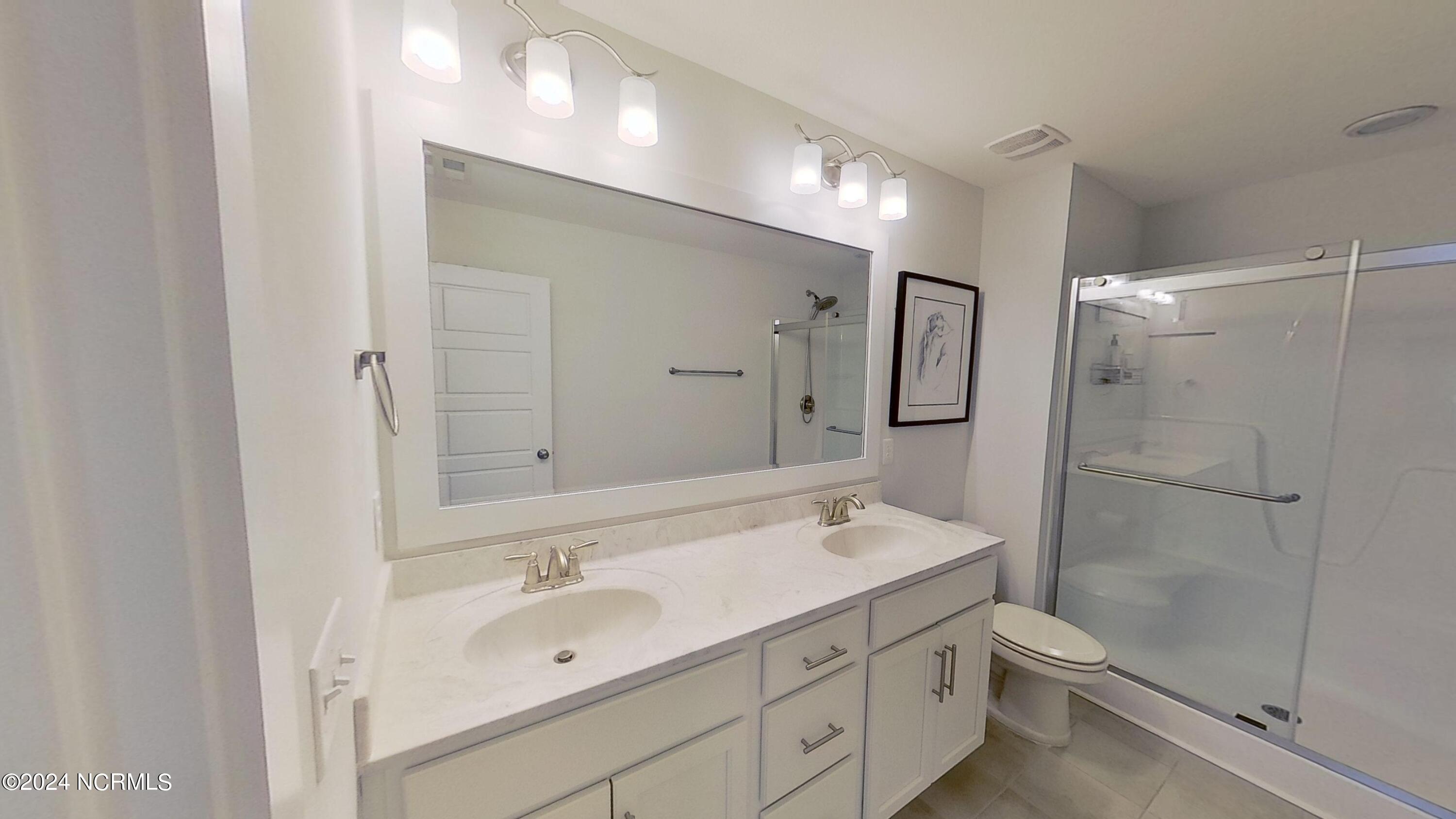 124 Aspen Road Hampstead, NC 28443 - Photo 16 of 35 124-Aspen-Rd-04112024_160448