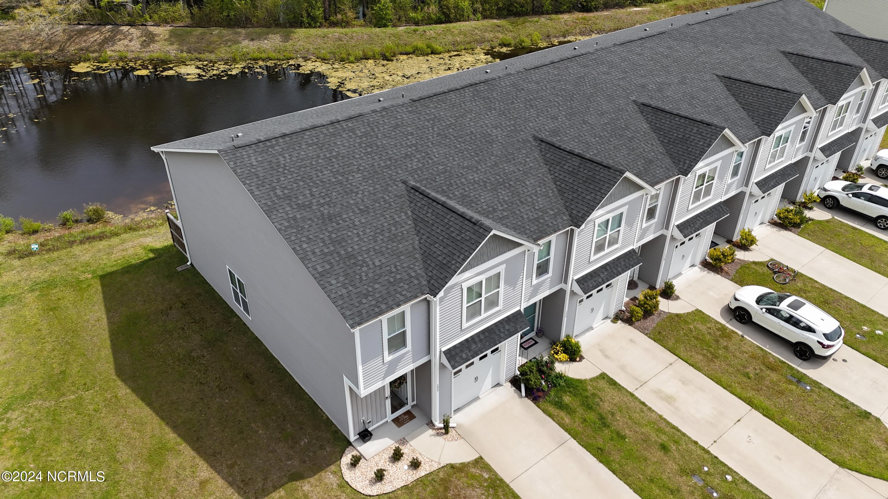 124 Aspen Road Hampstead, NC 28443 - Photo 27 of 35 dji_fly_20240410_121314_0059_17128592559