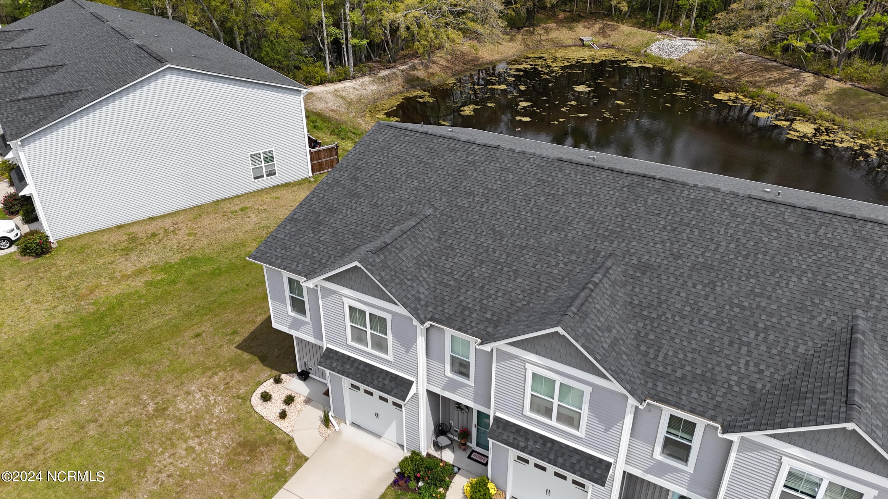 124 Aspen Road Hampstead, NC 28443 - Photo 28 of 35 dji_fly_20240410_121346_0061_17128592556