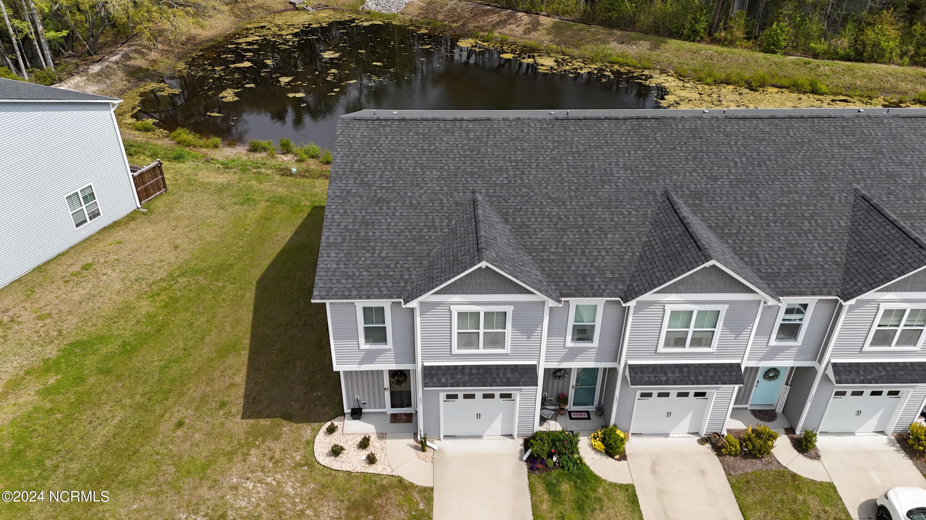 124 Aspen Road Hampstead, NC 28443 - Photo 29 of 35 dji_fly_20240410_121330_0060_17128592562