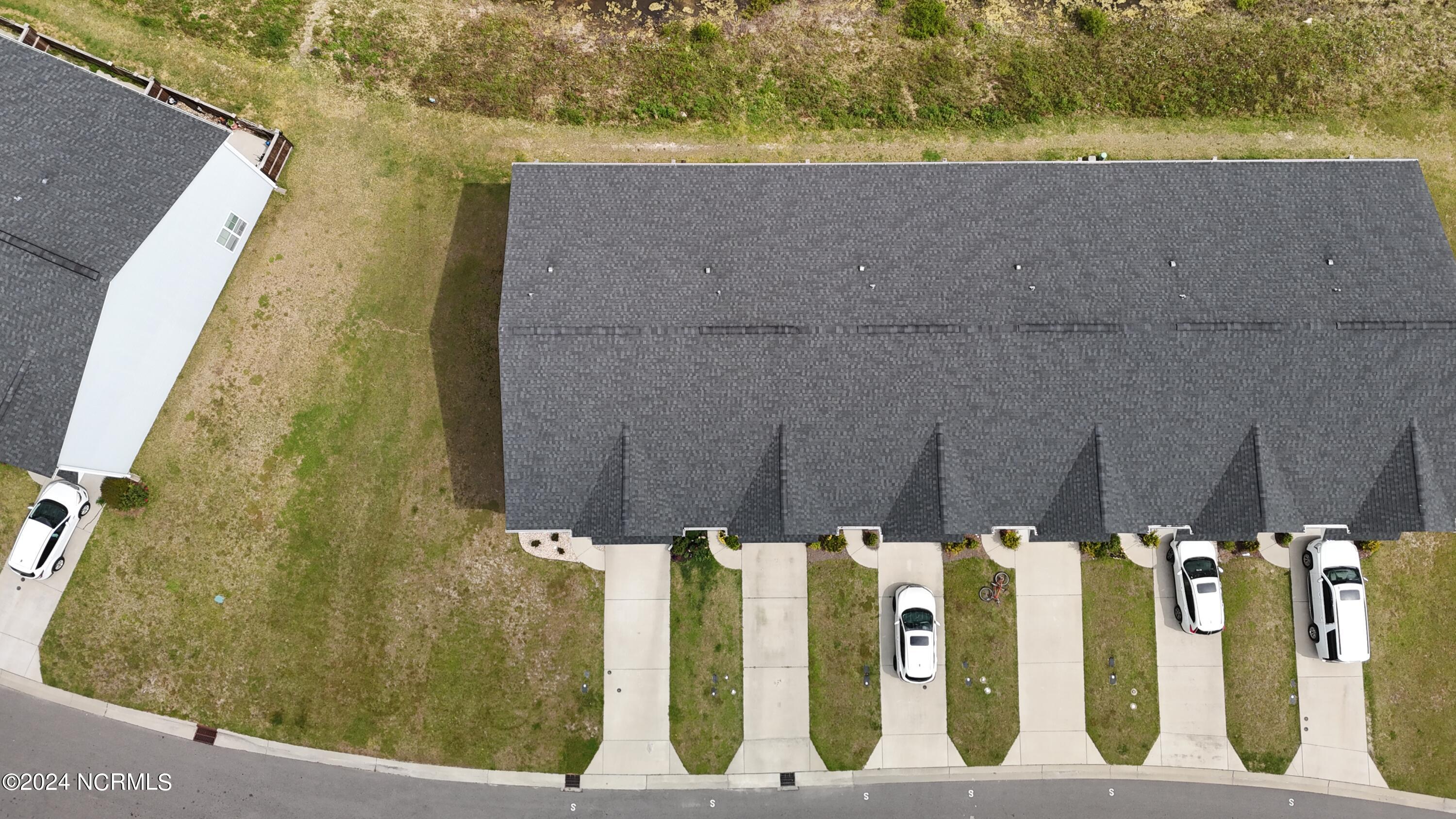 124 Aspen Road Hampstead, NC 28443 - Photo 30 of 35 dji_fly_20240410_120616_0051_17128592583