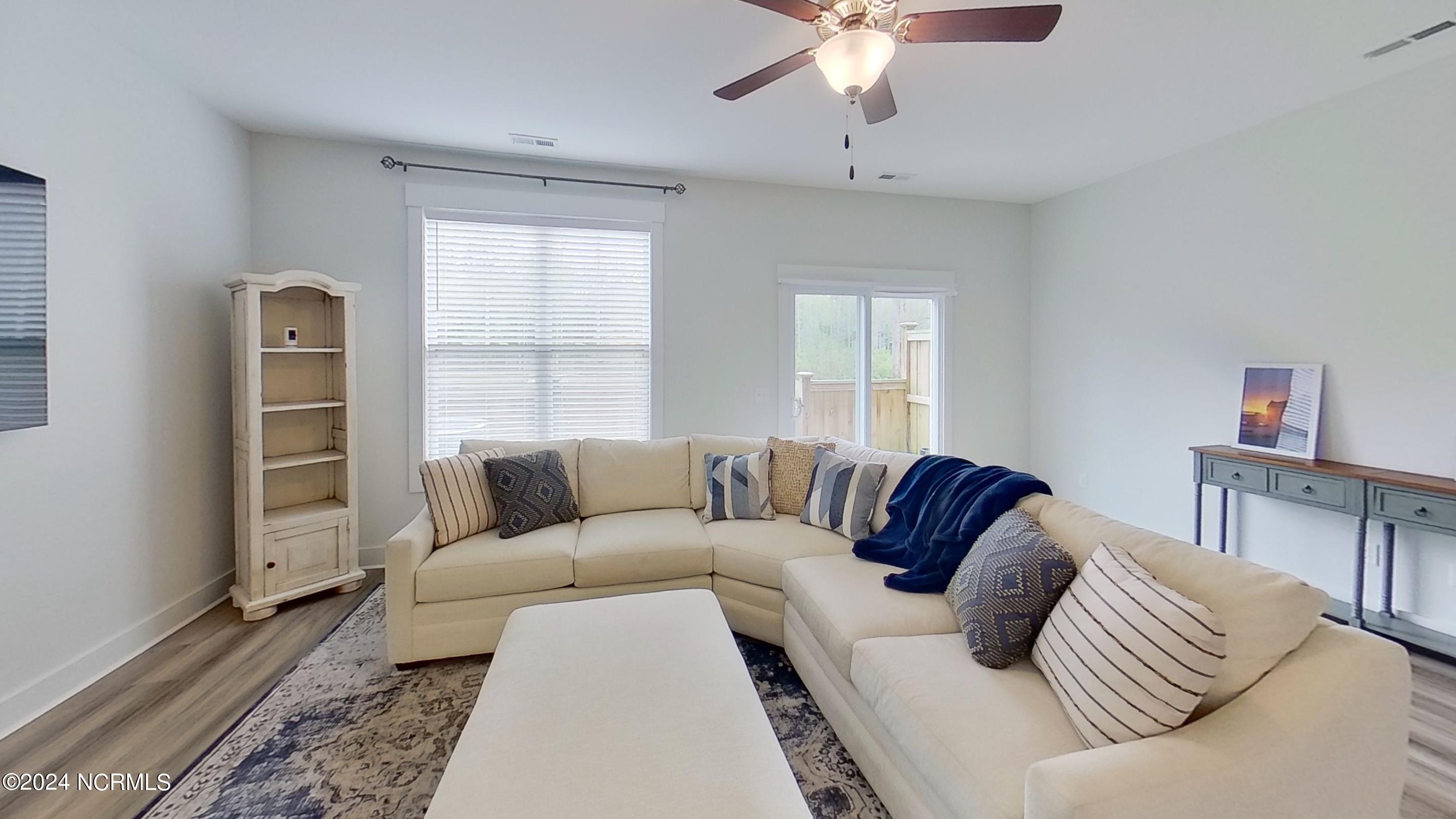 124 Aspen Road Hampstead, NC 28443 - Photo 8 of 35 124-Aspen-Rd-Living-Room 1