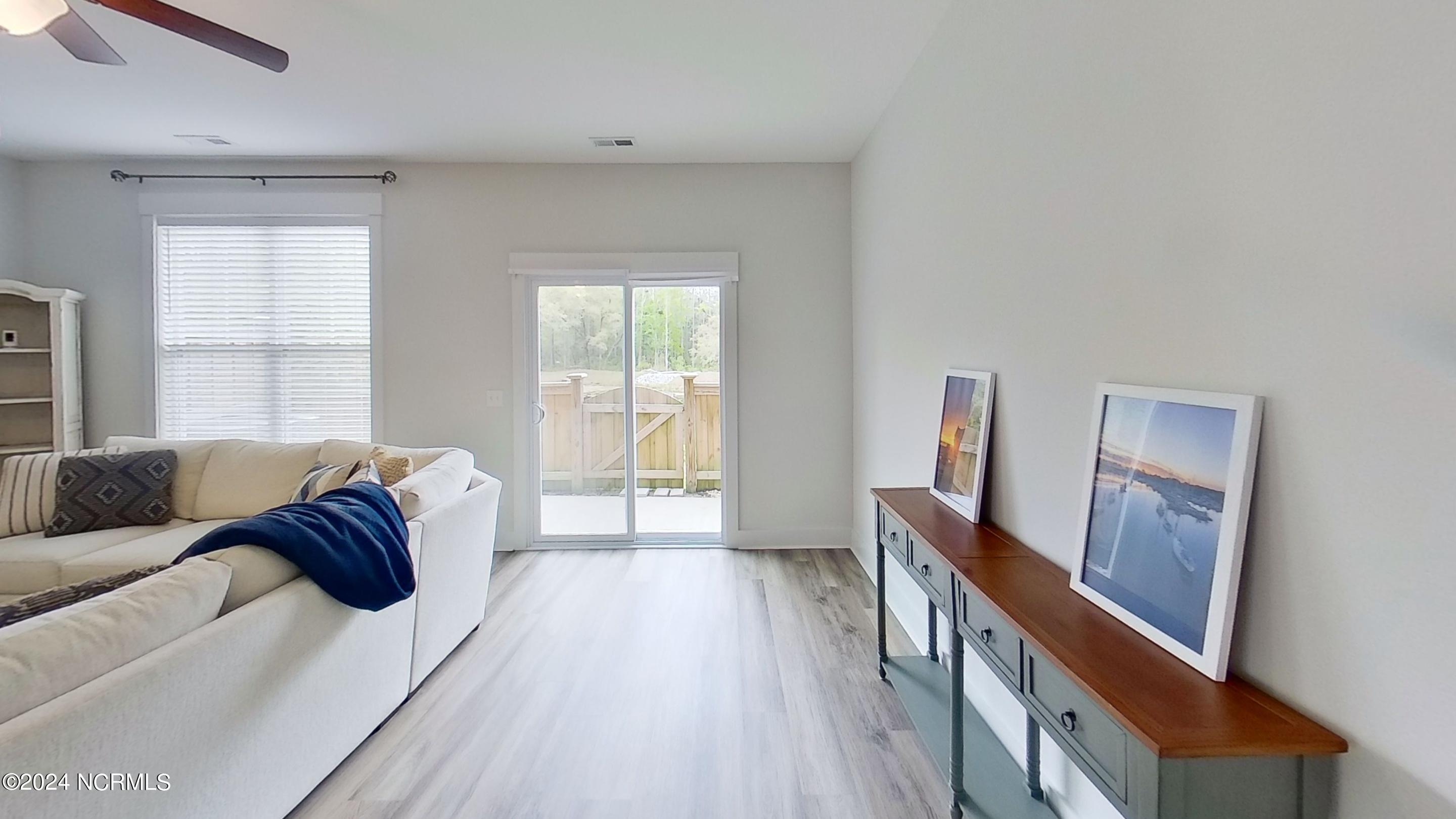124 Aspen Road Hampstead, NC 28443 - Photo 9 of 35 124-Aspen-Rd-Living-Room 2