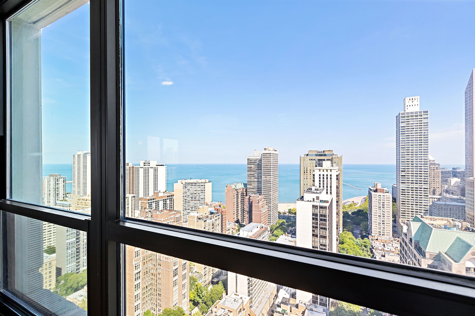 1030 North State Street, Unit 31E Chicago, IL 60610 - Photo 11 of 19 a view of a city from a window