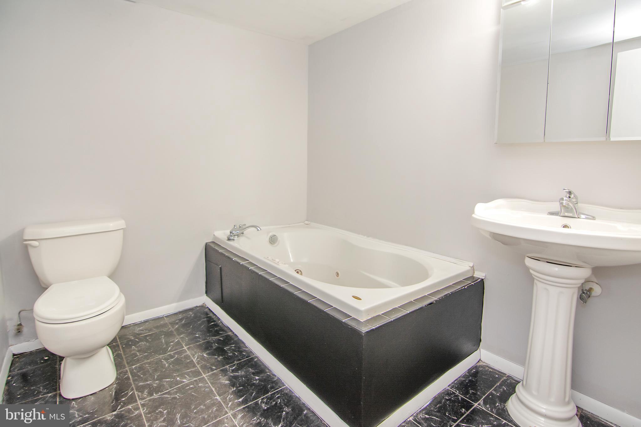 4010 Moravia Road Baltimore, MD 21206 - Photo 23 of 24 Full Bathroom with Jacuzzi Tub
