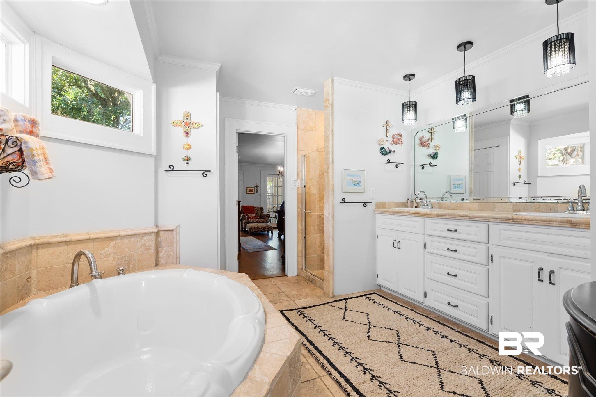 202 Woodlands Avenue Mobile, AL 36607 - Photo 18 of 53 Bathroom with vanity, crown molding, tiled bath, and tile patterned flooring